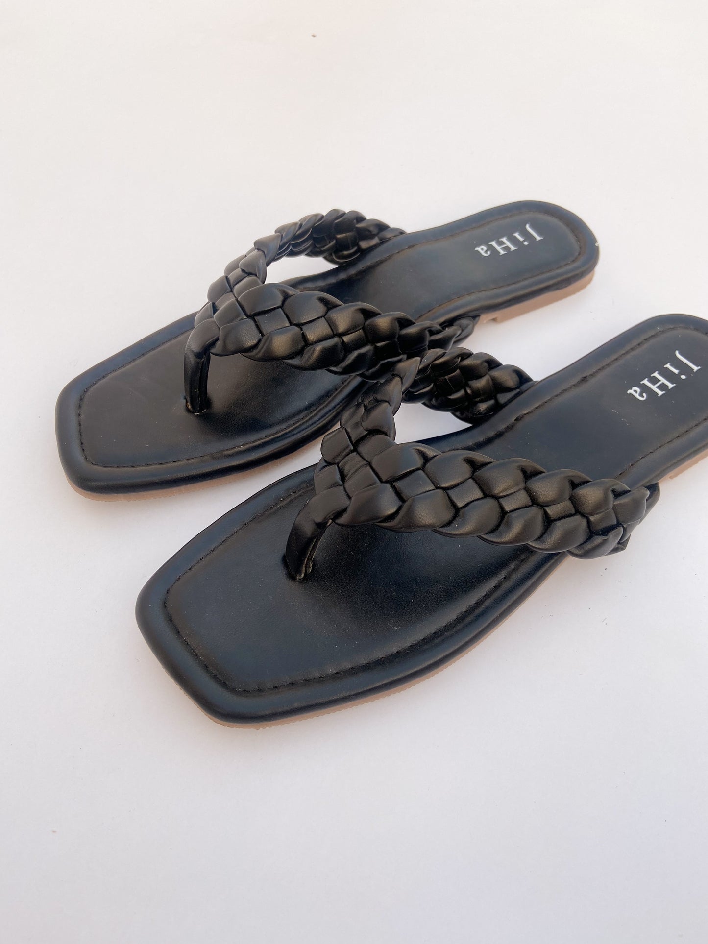 Black flat slide sandals
